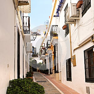 Typical Andalucia Spain old village whitewashed houses street