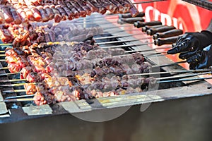 Typical Apulian pork and cheese rolls called bombette cooked on the barbecue