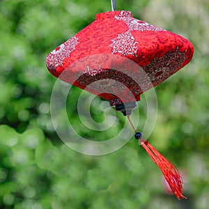 Chinese - vietnamese lampion in red with white ornaments