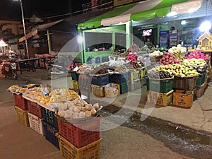 Typical Asian night market with delicious fruits