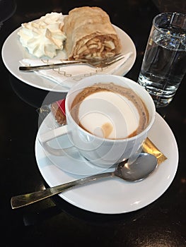 Typical Austrian Coffee with Apple Strudel