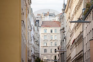 Typical Austro-Hungarian Facades wit old windows in a narrow street of Innere Stadt, the inner city of Vienna, Austria