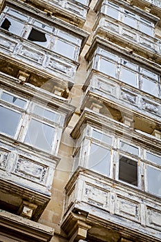 Typical balconies in the streets of Valetta, Malta