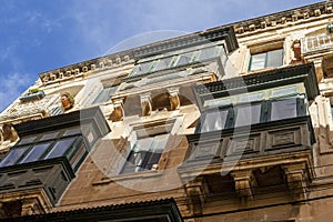 Typical balconies in the streets of Valetta, Malta