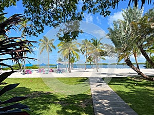A typical beach restaurant with colorful tables, chairs and umbrellas in the Florida Keys