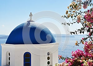 Typical blue dome in the Cyclades Islands. Here we are at Oia in Santorini