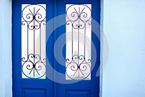 Typical blue door with stairs. Santorini island