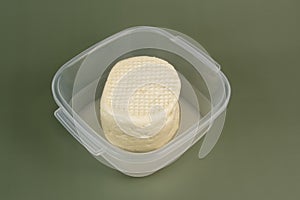 Typical Brazilian Minas cheese from Minas Gerais in transparent bowl