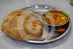 Typical breakfast in a small restaurante on the streets of Delhi photo