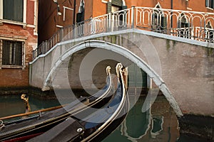 Typical bridge located in Venice with detail of gondola boat, It