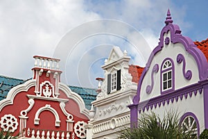 Typical brightly colours of red, green & purple painted architecture of Aruba, Curacao & Bonaire, Caribbean