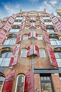 Typical Building with Red Shutters in Amsterdam