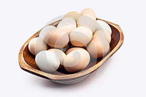 Typical caipira egg from brazil on isolated white background in straw basket