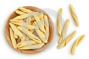 Typical Calabrian pasta called Maccheroncini or Maccheroni in wooden bowl isolated on white background with clipping