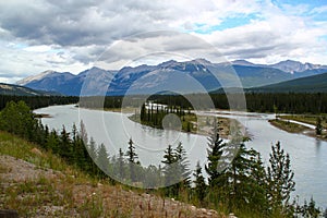 Typical Canada: Beautiful canadian landscape - River leads through beautiful mountain scenery