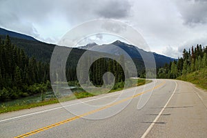 Typical Canada: Beautiful canadian landscape - Road leads through beautiful forest