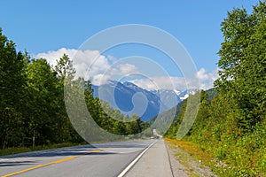 Typical Canada: Beautiful canadian landscape - Road leads through beautiful forest