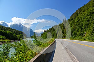 Typical Canada: Beautiful canadian landscape - Road leads through beautiful forest