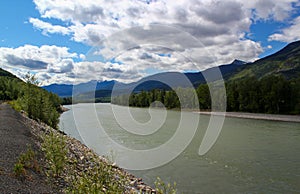 Typical Canada: River leads through beautiful mountain scenery