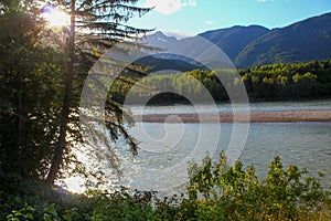 Typical Canada: River leads through beautiful mountain scenery