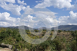 Typical Castilian inland landscape with mountains and flat areas under a bright sky