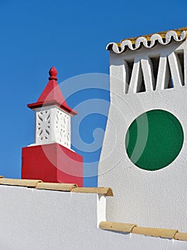 Typical chimneys on a roof in Portugal