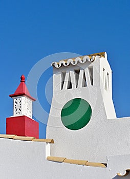 Typical chimneys on a roof in Portugal