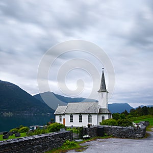 Typical christianity church with cemetery of Nes village