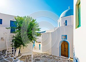 Typical church with blue dome in Lefkes photo