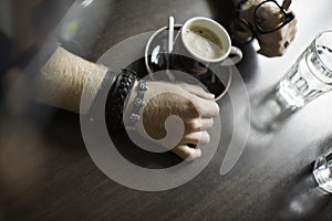 Typical coffee terrace with two cups of coffe on the tables and chairs
