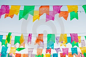 Typical colorful flags used for decoration at the June Festivals aka festas de Sao Joao, with copy space