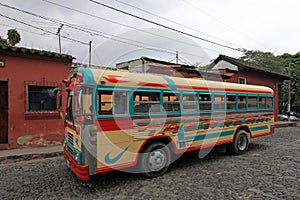 Typical colorful guatemalan chicken bus in Antigua, Guatemala