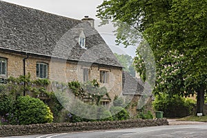 Typical Cotswold cottages on the River Eye, Lower Slaughter, Gloucestershire, Cotswolds, England, UK