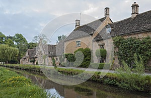 Typical Cotswold cottages on the River Eye, Lower Slaughter, Gloucestershire, Cotswolds, England, UK