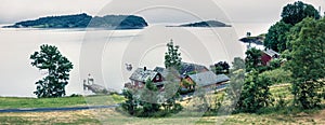 Typical countryside Norwegian landscape. Misty summer panorama of Norway, Europe. Beauty of countryside concept background.