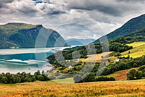 Typical countryside Norwegian landscape. Summy summer morning in Norway, Europe. Beauty of nature concept background. Artistic