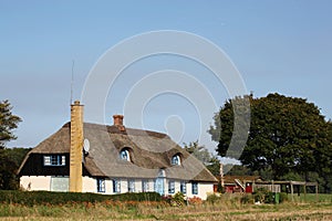 Typical danish house with thatched roof