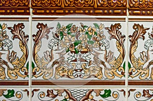 Typical decoration of the facade of the house in Lisbon. Traditional ceramic tiles Azulejos