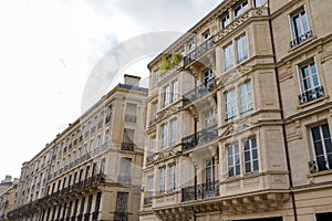 Typical design of Parisian architecture hausmann facade of french building in block of apartments in bordeaux France