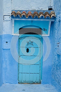 A typical door in the city of Chaouen photo