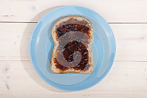 Typical Dutch apple syrup called Appelstroop on bread