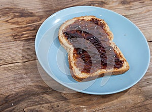 Typical Dutch apple syrup called Appelstroop on bread