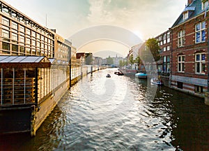 Typical Dutch canal located behind the flower market in Amsterdam.