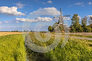 Typical dutch landscape windmill