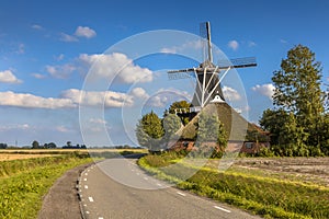 Typical dutch landscape windmill