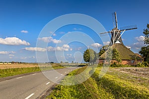 Typical dutch landscape windmill