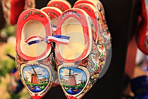 Typical Dutch shoes. traditional red Amsterdam clogs bought as souvenir gifts