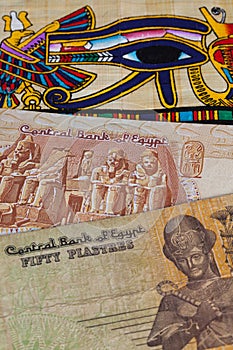 Typical Egyptian papyrus and different banknotes