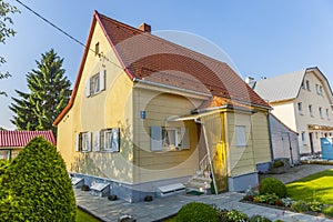 Typical elderly house in housing area in a suburban street of Munich, Germany