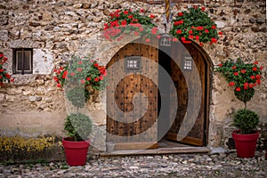 Typical facade of the old Provencal stone house Perouges, France